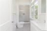 Sample of bathroom from another home by this builder