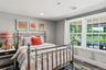Bedroom on lower level with WIC and waterviews