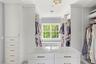 Custom built-in cabinetry, center island with stone countertop