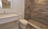 Even the lower level full bath is beautifully finished in homes by this builder (sample)