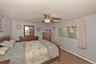 Lower Level Spacious Bedroom with Ceiling Fan