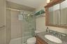 Lower Level New Bath Room (1yr) with walk in Shower+ Sliding Glass Door