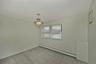 Lower Level 5th Bdrm with tile flooring