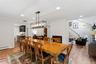 Dining Room with Fireplace, adjacent to Den and Living Room