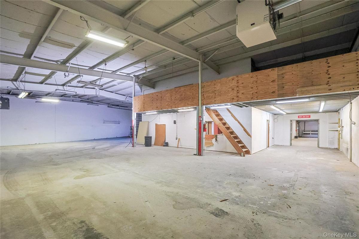 Garage featuring a heating unit