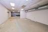 Basement with a paneled ceiling