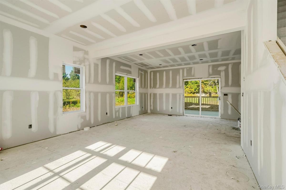 Cabinets are ordered. Main cabinets in "dove" color. Island will be similar to flooring.