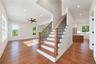 Virtually Staged - Entrance. First Floor will have hardwoods. Railings will have black spindles and oak railing.