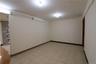 Tile flooring, recessed lighting, and a sliding door track