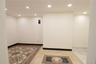 Recessed lighting throughout, accent tile flooring, and light-toned walls
