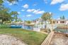 Boating starts in your own backyard, with canal frontage, private dockage, a boat lift, and direct access toward the Gulf—all just steps from the lawn