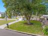 magnificent mature oak anchors the broad front lawn, while the home’s corner setting creates a wonderful sense of space and separation from neighborin