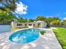 beautiful pool view with extended patio