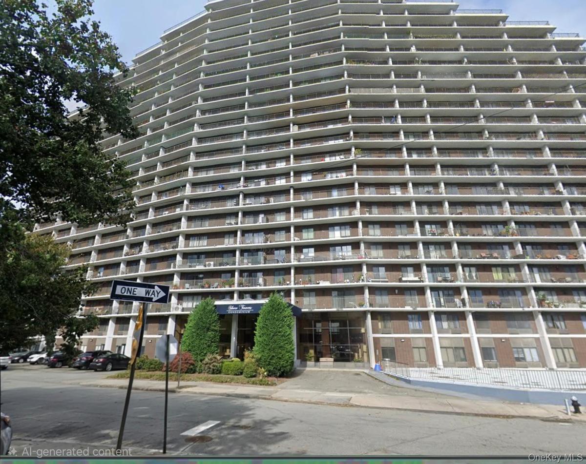 Multi-story building facade with extensive private balconies