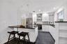 Kitchen island with breakfast area.