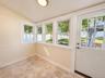 Beautiful room for many occasions, lots of windows, door leading out to the patio.