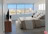 Bedroom with city views