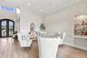 FORMAL SITTING AREA WITH HIDDEN BAR