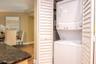 A dedicated in-unit laundry closet adds convenience and ease to your routine.