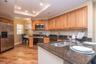 The kitchen includes a distinct eat-in area that easily converts to additional pantry and storage space to suit your lifestyle.