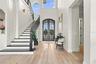 FRONT ENTRY W/26 FOOT CEILINGS