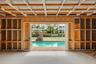 View from the front entry area to the pool and on out to the dock and canal