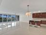 Dining room and open kitchen (showing unfurnished)