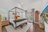 Vaulted ceiling accentuates the spacious room