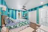 Wood-finish flooring with a ceiling fan