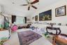 Carpeted flooring with a white sloped ceiling, recessed lighting, and a ceiling fan