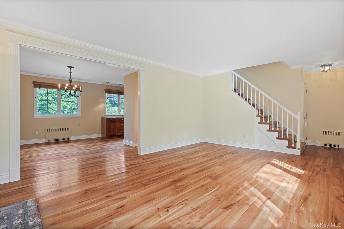 Great Open Layout With Hardwood Floors & Natural Lighting