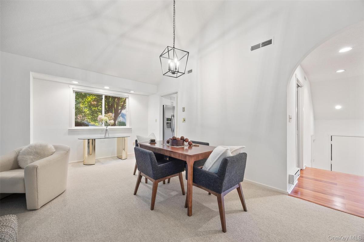 Open-plan Great room provides the perfect spot for a dining table with easy access to the kitchen.