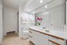 Large hall bathroom with laundry.