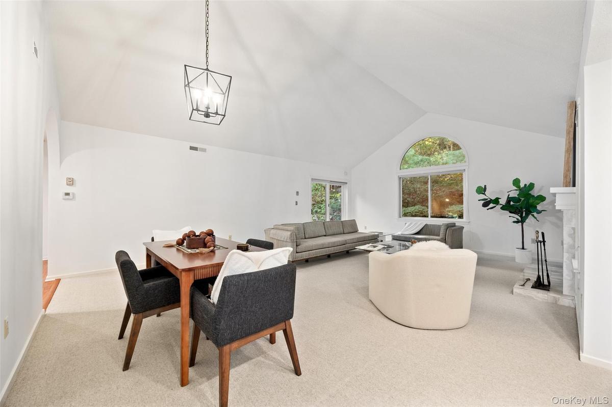 Open-plan Great room provides the perfect spot for a dining table with easy access to the kitchen.
