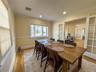Hardwood flooring, recessed lighting, crown molding, chair rail molding, and French doors