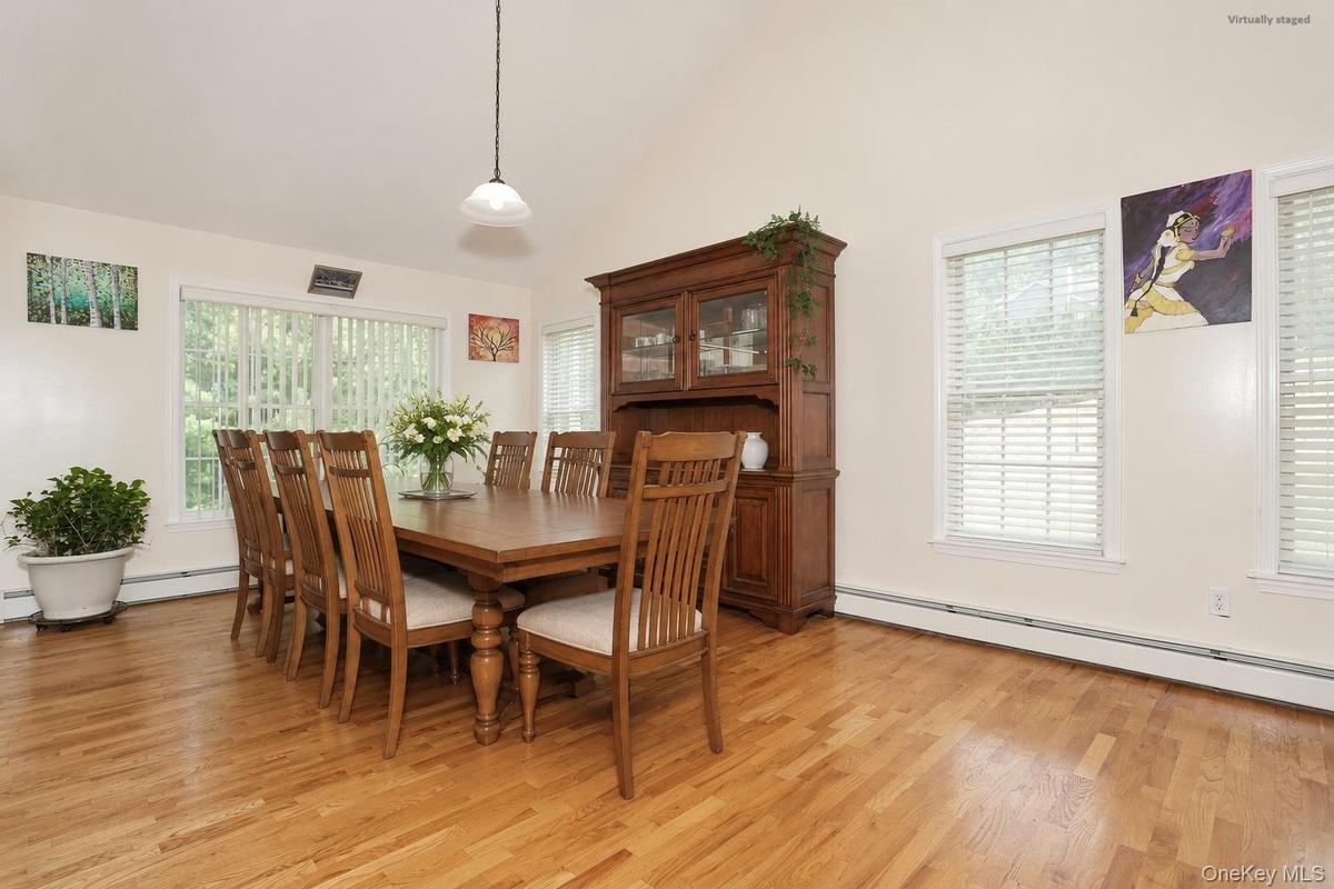 Dining Room with vaulted ceiling