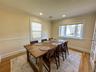 Hardwood flooring throughout, recessed lighting, crown molding, and chair rail detailing