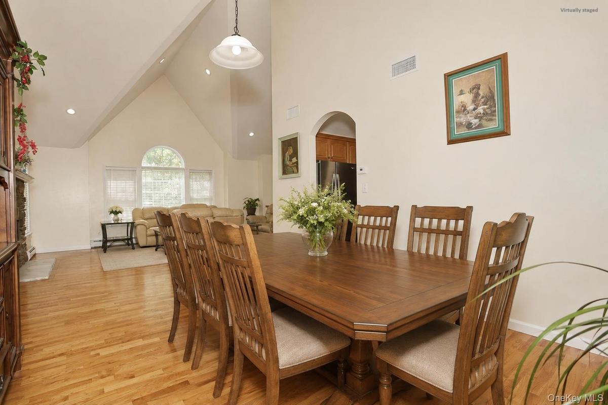 Dining Room with vaulted ceiling