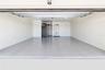 2 Car garage with epoxy floors. Plus extra storage in the garage. Hurricane doors