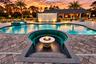 Sunken Lounge and firepit feature, water wall and spa.