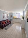 Comfortable den with step up bed, maximizing the water view