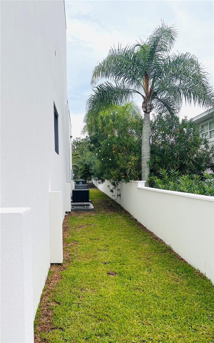 SOUTH SIDE WITH SURROUNDING WALL