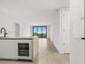 Open kitchen and living area with large center island