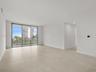 Open living area with direct access to private balcony