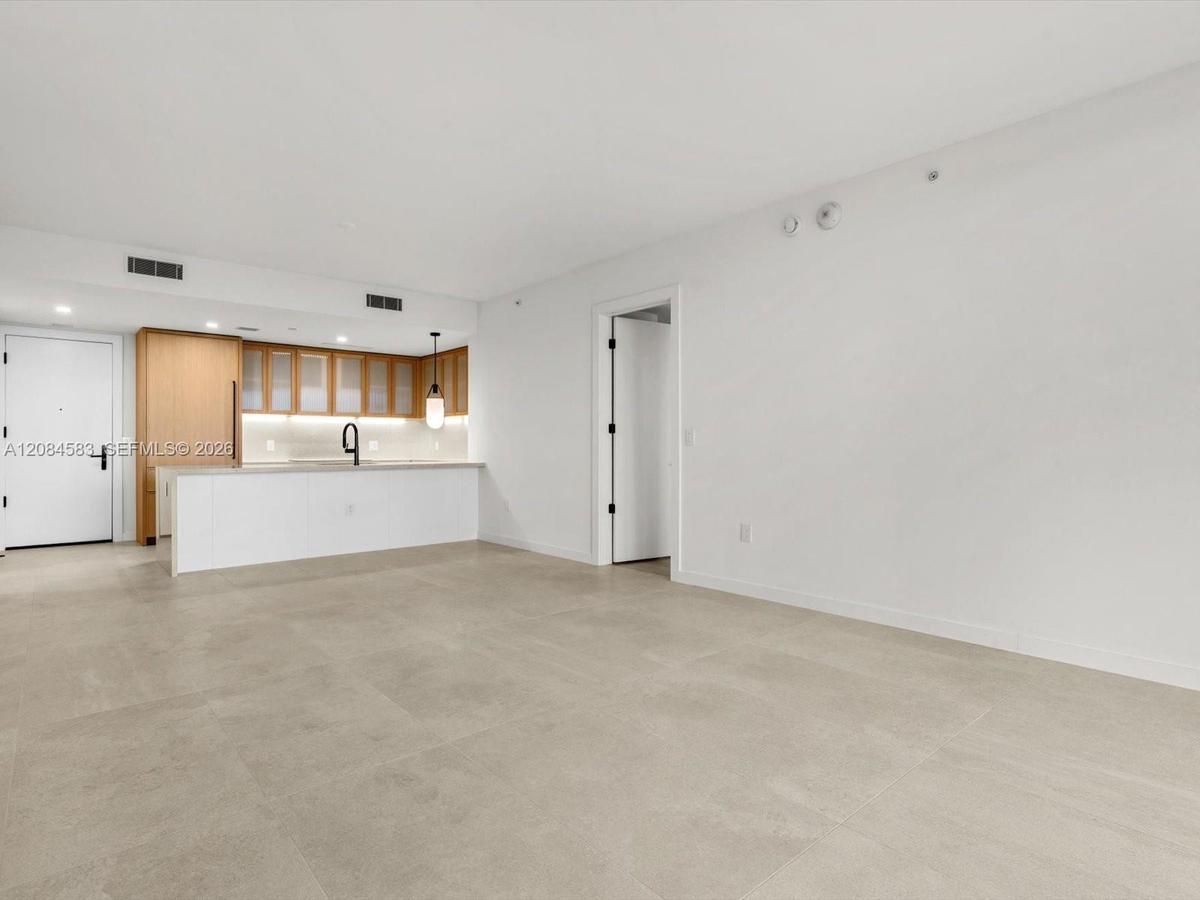 Spacious living and dining area with abundant natural light