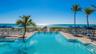Experience coastal serenity at the Beach Club, where your private beach retreat, sun-drenched pool deck, and sophisticated oceanfront bar and dining a