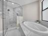 tub and shower built in