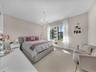 second bedroom upstairs overlooking the green areas