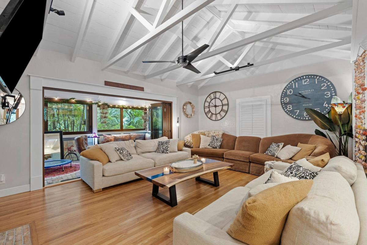 Living room, with open beam ceiling.