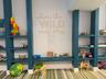 Built-in shelving units in a teal finish